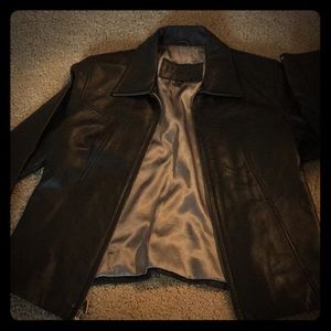 Genuine leather jacket by Guess.